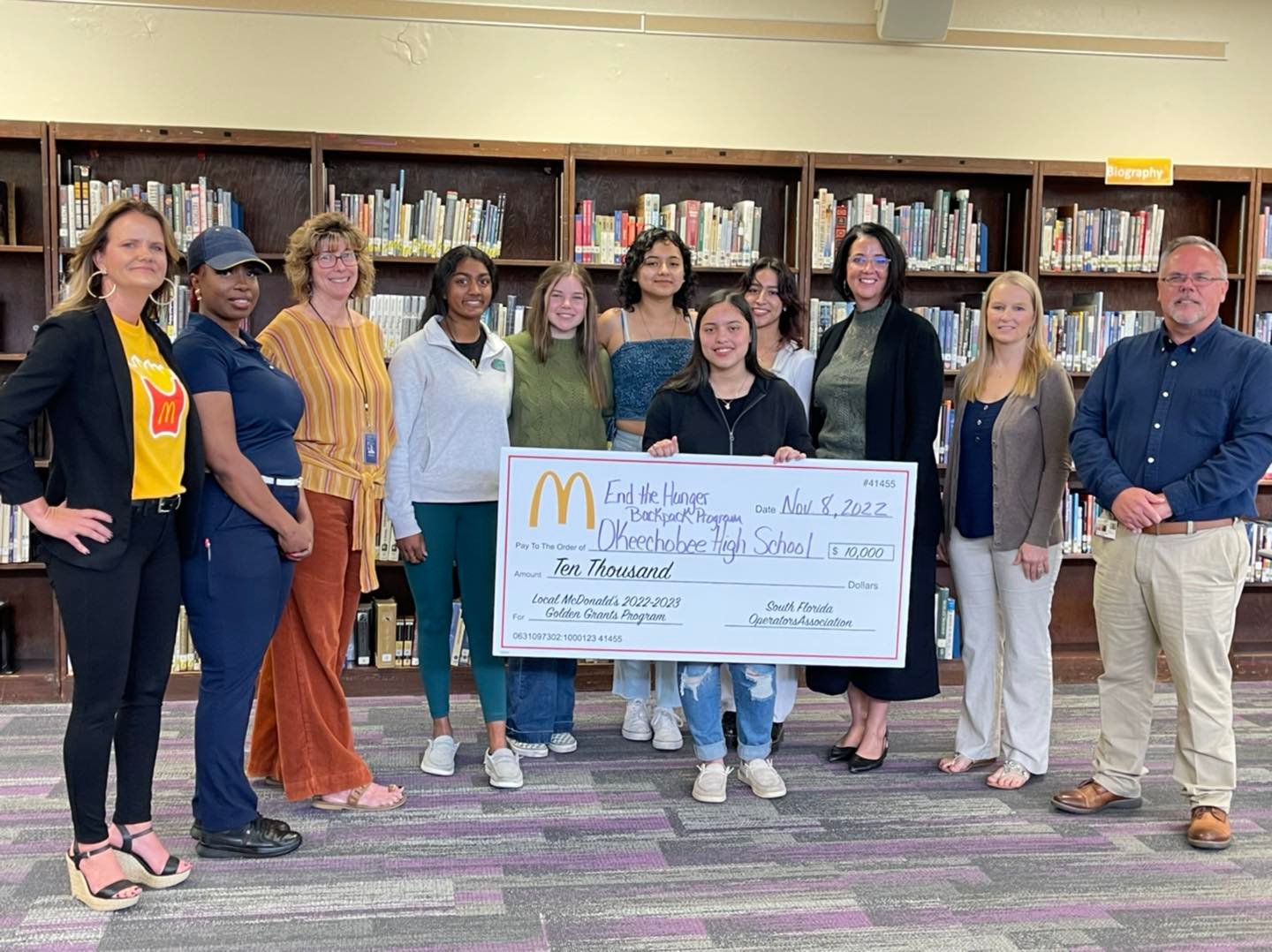 OKEECHOBEE -- Okeechobee High School National Honor Society End the Hunger “Backpack Program” was awarded the McDonald’s Golden Grant Award in the amount of $10,000/ This generous recognition and gift will go a long way to help raise the near $50,000 needed to fund the initiative for one school year. This student led program has now grown to feed 220 Okeechobee County elementary students two meals each weekend. It costs $225 to sponsor a child for the year.  OHS thanks the Nisbet Family and the McDonald’s Corporation for their partnership and support. [Photo courtesy OHS]